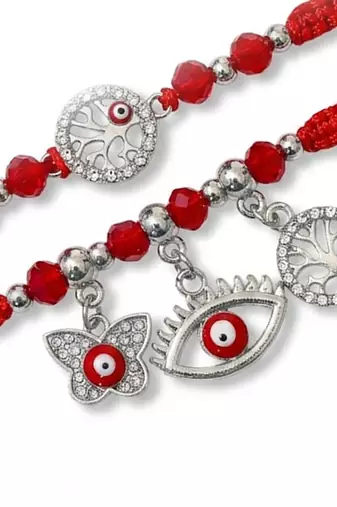 set of 2 red & silver evil eye design bhaiya bhabhi rakhi with roli chawal chandan