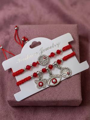 set of 2 red & silver evil eye design bhaiya bhabhi rakhi with roli chawal chandan 5