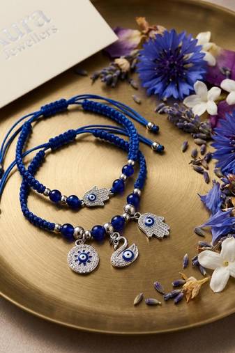 set of 2 blue & silver evil eye design bhaiya bhabhi rakhi with roli chawal chandan