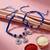 set of 2 blue & silver evil eye design bhaiya bhabhi rakhi with roli chawal chandan