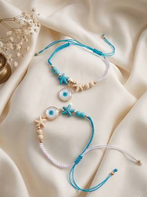 set of 2 blue evil eye & white pearl bhaiya bhabhi rakhi with roli chawal chandan 5