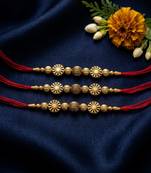set of 3 red & gold toned artificial stones & beads thread rakhi with roli chawal