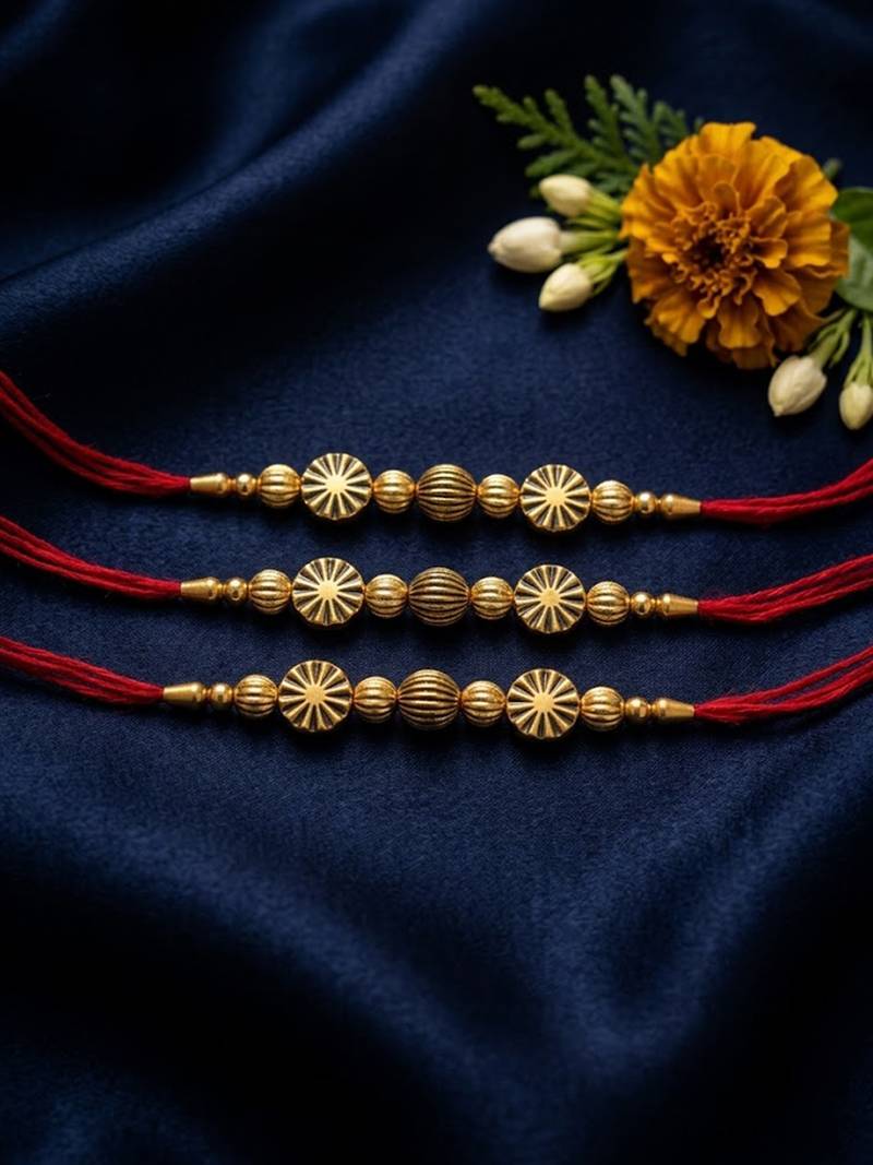 set of 3 red & gold toned artificial stones & beads thread rakhi with roli chawal