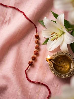 religious rudraksh thread rakhi with roli chawal chandan mishri 1