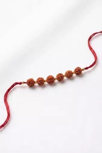 religious rudraksh thread rakhi with roli chawal chandan mishri