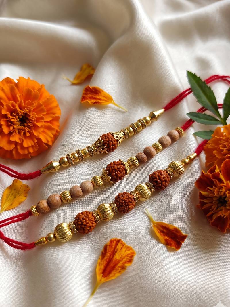 set of 3 religious rudraksh red thread rakhi with roli chawal chandan mishri
