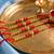 set of 4 artificial beads red thread rakhi with roli chawal chandan mishri