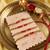 set of 4 artificial beads red thread rakhi with roli chawal chandan mishri