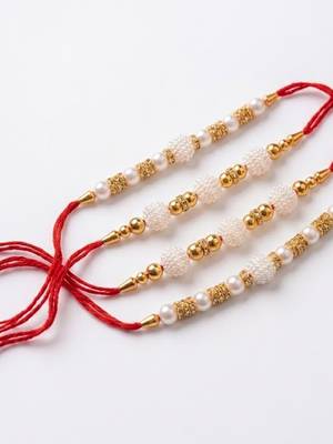 set of 4 white pearls & red thread rakhi with roli chawal chandan mishri 3