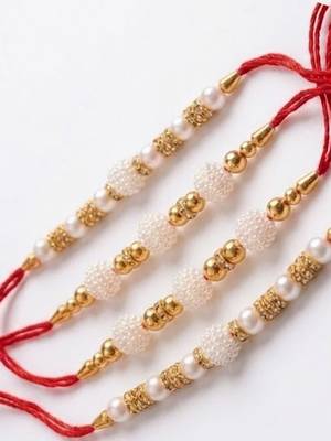 set of 4 white pearls & red thread rakhi with roli chawal chandan mishri 5