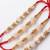 set of 4 white pearls & red thread rakhi with roli chawal chandan mishri