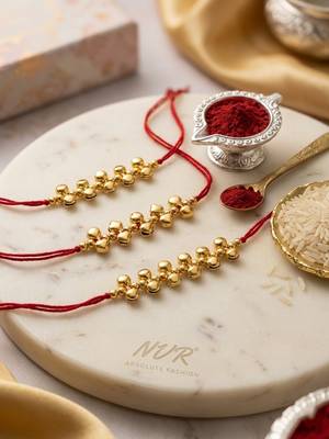 set of 3 gold toned ghungroo & red thread rakhi with roli chawal chandan mishri 1