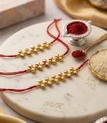 set of 3 gold toned ghungroo & red thread rakhi with roli chawal chandan mishri