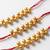 set of 3 gold toned ghungroo & red thread rakhi with roli chawal chandan mishri