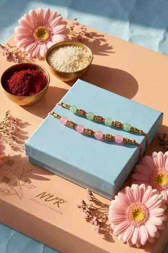 set of 2 pink & green artificial beads thread rakhi with roli chawal chandan mishri