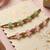 set of 2 pink & green artificial beads thread rakhi with roli chawal chandan mishri