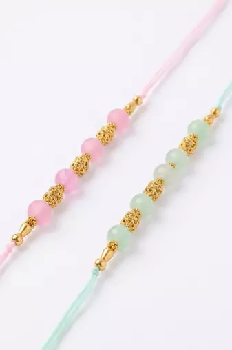 set of 2 pink & green artificial beads thread rakhi with roli chawal chandan mishri