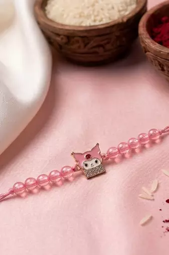 pink transparent beaded cartoon character kids rakhi with roli chawal chandan mishri