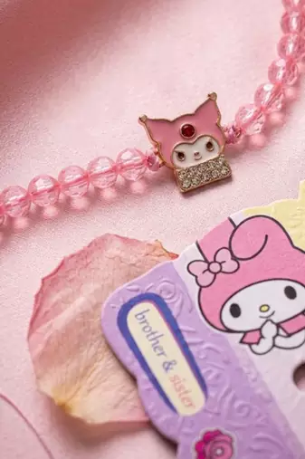 pink transparent beaded cartoon character kids rakhi with roli chawal chandan mishri