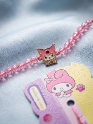 pink transparent beaded cartoon character kids rakhi with roli chawal chandan mishri 5
