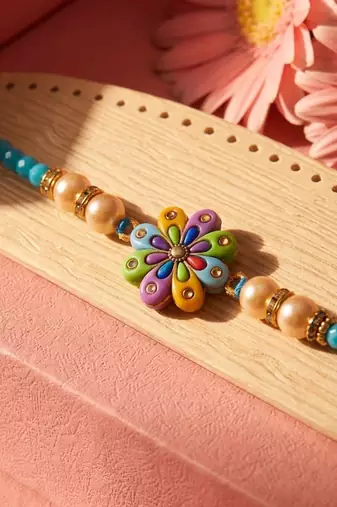 artificial beads flower shape multicolor thread rakhi with roli chawal chandan mishri