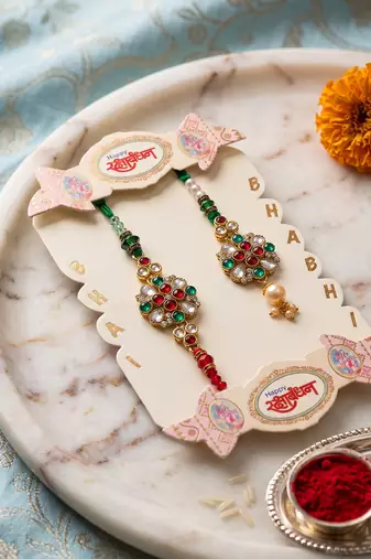 set of 2 floral design kundan studded bhaiya bhabhi rakhi with roli chawal chandan