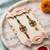 set of 2 floral design kundan studded bhaiya bhabhi rakhi with roli chawal chandan
