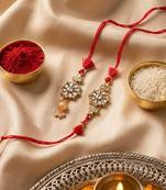 set of 2 red kundan studded floral design bhaiya bhabhi rakhi with roli chawal