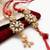 set of 2 red kundan studded floral design bhaiya bhabhi rakhi with roli chawal