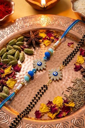 set of 2 blue evil eye artificial stones bhaiya bhabhi rakhi with roli chawal chandan