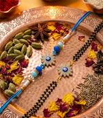 set of 2 blue evil eye artificial stones bhaiya bhabhi rakhi with roli chawal chandan