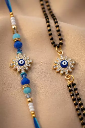 set of 2 blue evil eye artificial stones bhaiya bhabhi rakhi with roli chawal chandan