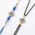 set of 2 blue evil eye artificial stones bhaiya bhabhi rakhi with roli chawal chandan