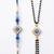 set of 2 blue evil eye artificial stones bhaiya bhabhi rakhi with roli chawal chandan