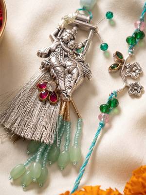 set of 2 designer religious silver toned bhaiya bhabhi rakhi with roli chawal chandan 2