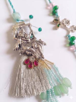 set of 2 designer religious silver toned bhaiya bhabhi rakhi with roli chawal chandan 3