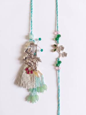set of 2 designer religious silver toned bhaiya bhabhi rakhi with roli chawal chandan 5