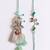 set of 2 designer religious silver toned bhaiya bhabhi rakhi with roli chawal chandan
