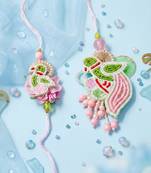 set of 2 leaf design pearls & artificial stones bhaiya bhabhi rakhi with roli chawal