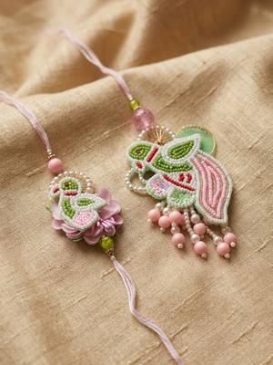 set of 2 leaf design pearls & artificial stones bhaiya bhabhi rakhi with roli chawal 2