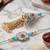 set of 2 pearls & artificial stones floral bhaiya bhabhi rakhi with roli chawal