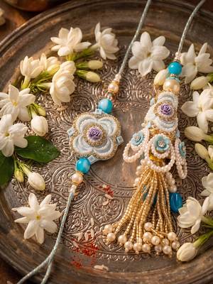 set of 2 pearls & artificial stones floral bhaiya bhabhi rakhi with roli chawal 2