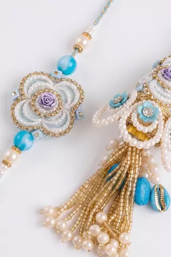 set of 2 pearls & artificial stones floral bhaiya bhabhi rakhi with roli chawal