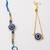 set of 2 blue evil eye gold toned bhaiya bhabhi rakhi with roli chawal chandan mishri