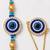 set of 2 blue evil eye gold toned bhaiya bhabhi rakhi with roli chawal chandan mishri