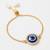 set of 2 blue evil eye gold toned bhaiya bhabhi rakhi with roli chawal chandan mishri