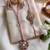 set of 2 white artificial stones golden toned bhaiya bhabhi rakhi with roli chawal