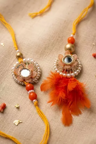 set of 4 yellow artificial beads & white pearls bhaiya bhabhi rakhi with roli chawal