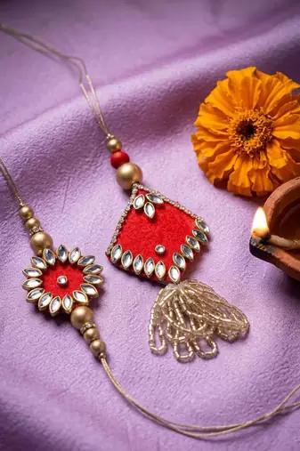 set of 2 kundan studded & artificial stones bhaiya bhabhi rakhi with roli chawal