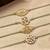 set of 4 white artificial stones & green thread rakhi with roli chawal chandan mishri